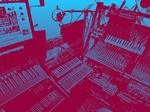 general view of synthesiser layout in studio red and blue tint
