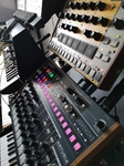 close up of synthesisers on rack